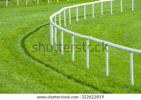 close up railing bend of a horse race track