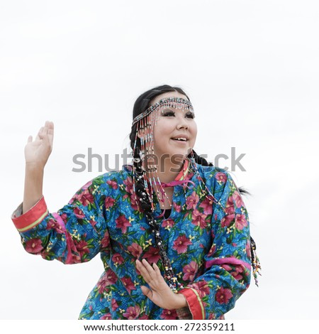 KAMCHATKA, RUSSIA - AUGUST 9, 2014: Expression woman dance. Public concert Koryak Folk Dance Ensemble Angt on the Khalaktyrsky Beach around Petropavlovsk-Kamchatsky City.