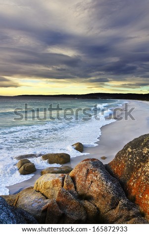 Cloudy landscape on an empty beach in Tasmania, Australia.