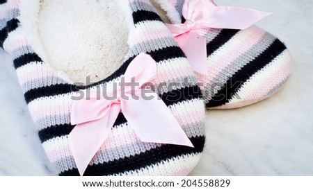 Cheesy and ugly stripped pink sleepers on a white background.
