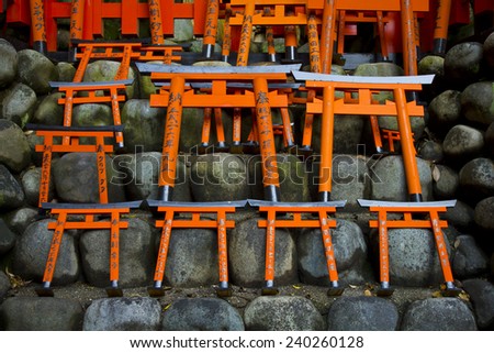 Many small wood tori shrine gates as a Japanese souvenir.