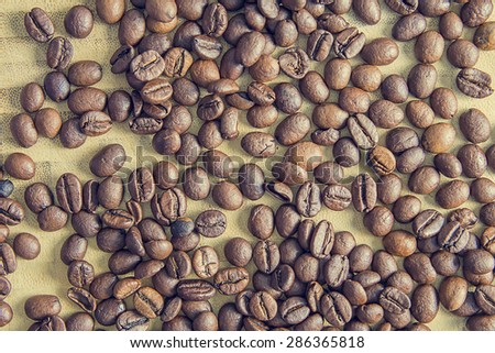 Brown coffee raw beans background texture