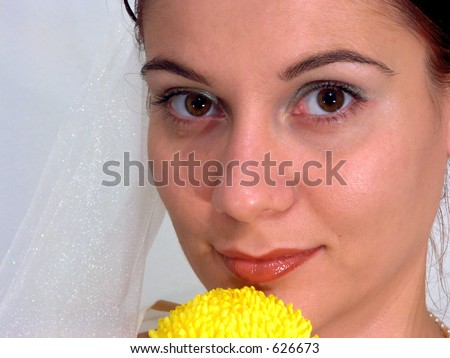Shy bride with yellow flower