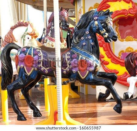 Horse  Merry Go Round in stop action. Saturation Color and antique Pattern.