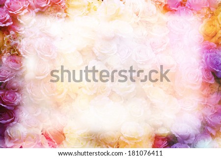 Greeting card design with blossom rose frame. Faded and blurred roses inside card area.