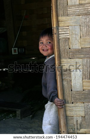 LUANG PRABANG,LAOS-DECEMBER 2,2005: Laos hill tribe children in tribe village.They are three tribe in Laos.Lowland Tribe,Upland Tribe and Highland Tribe.
