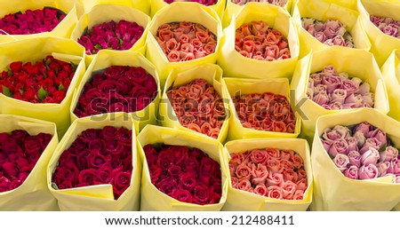 Red and Pink Roses in yellow paper package for valentine and lovely.