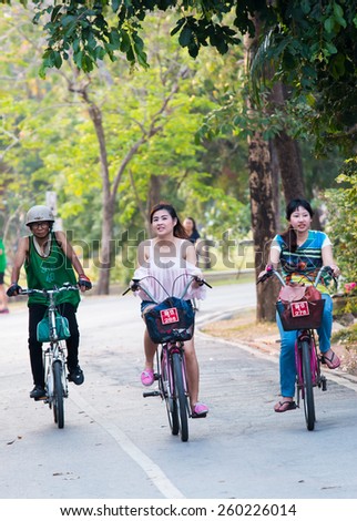 BANGKOK,THAILAND-MARCH 13, 2015: People rest by drive bicycle in Jatujak Public Park,famous and celebrated public park in Bangkok.