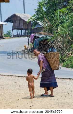 LUANG PRABANG, LAOS - APRIL 17, 2015: The simple  every day life of laos hill tribe in tribe village on the way from vientiane to Luang Prabang.