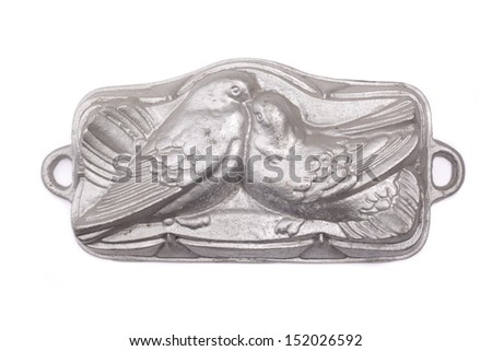 Cake tin with pigeons isolated on white