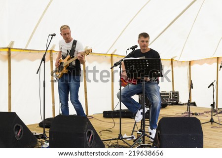 NORTHUMBERLAND, ENGLAND, AUGUST 30, 2014. Music duo Paul and Rich perform at fund raising event in aid of Great North Air Ambulance. August 30, 2014, Northumberland, England, UK.
