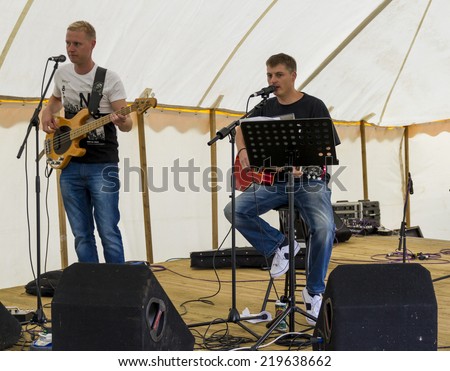 NORTHUMBERLAND, ENGLAND, AUGUST 30, 2014. Music duo Paul and Rich perform at fund raising event in aid of Great North Air Ambulance. August 30, 2014, Northumberland, England, UK.