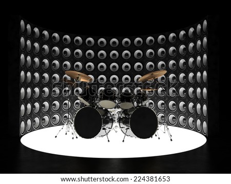 Drum kit surrounded by a wall of speakers