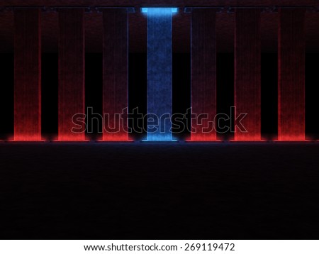 Abstract high tower illuminated with red light, one of them is highlighted in blue