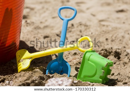 Sand Castle Toys/ a child's sand castle toys on the beach