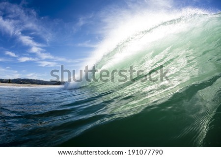Tubing Wave/ taken using a water housing in the surf, a wave tubes and barrels.