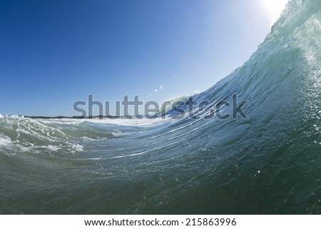 Perfect Wave/ the perfect wall of a glassy wave on the Sunshine Coast, Queensland, Australia. Shot from the water, a surfer\'s perspective