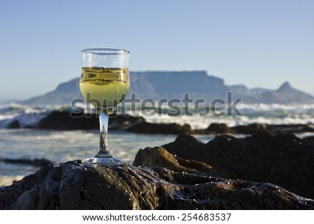 Glass of wine with Table mountain in the background.
