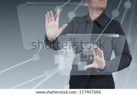 businesswoman hand working with new interface computer graph as concept