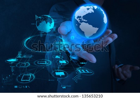 Businessman Hand Working With New Modern Computer Show The Earth Social Network Structure As Concept