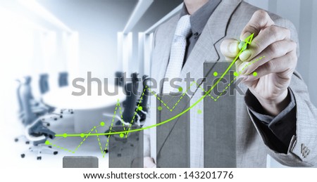 businessman hand working with new computer interface show building development concept