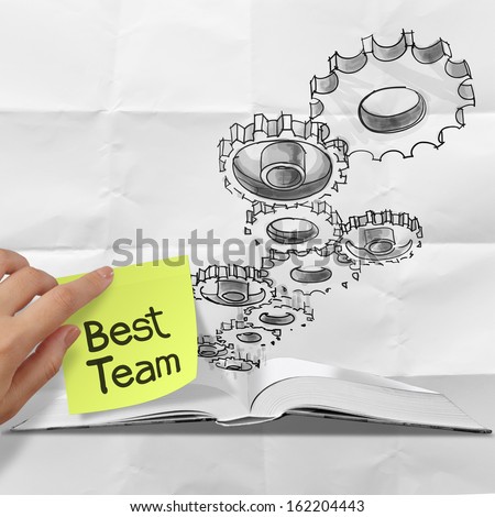 hand drawn gear cog best team with sticky note on crumpled paper as concept