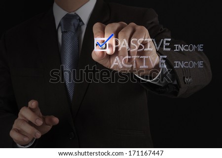 businessman hand checking  passive or active income as money concept