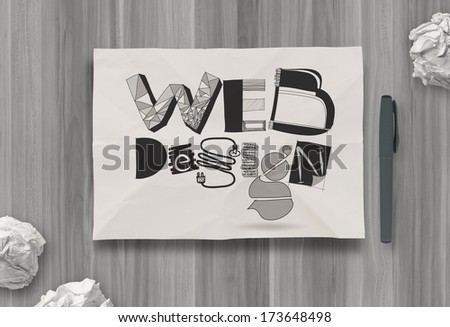 hand drawn web design diagram on crumpled paper background as concept