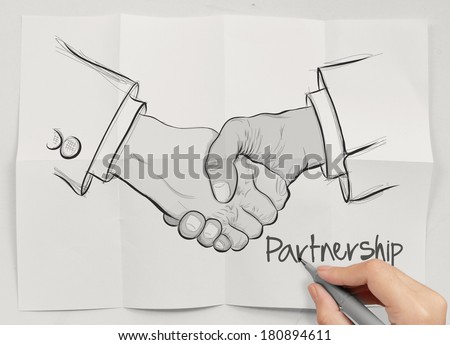 hand drawn handshake sign as partnership business concept