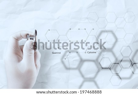 doctor chemist hand showing chemical formulas on crumpled paper