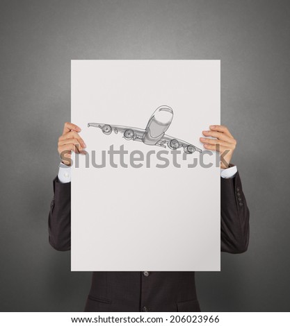 businessman showing poster of hand drawn airplane with crumpled paper background as concept