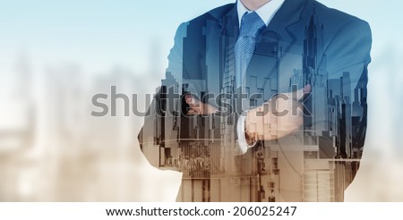 Double exposure of businessman and abstract city
