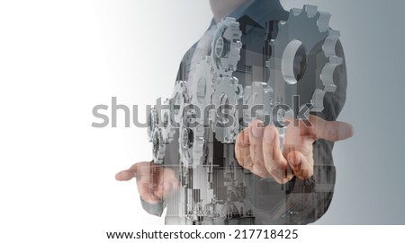 Double exposure of businessman hand draws gear to success concept