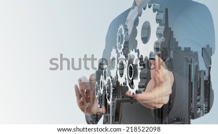 Double exposure of businessman hand draws gear to success concept