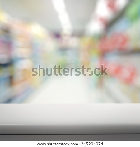 Empty laminate shelf and blurred  background for business product presentation