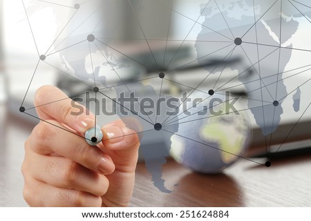 close up of hand working with new modern computer show social network structure as concept