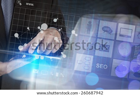 Double exposure of businessman shows modern technology as concept
