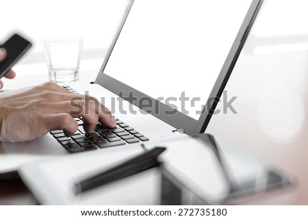 Young creative designer hand working with laptop at office as concept