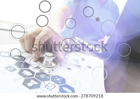 Doctor working with  laptop computer in medical workspace office and medical network media diagram as concept
