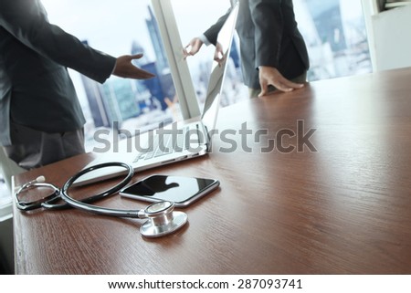 team doctor working with laptop computer in medical workspace office and medical network media diagram as concept
