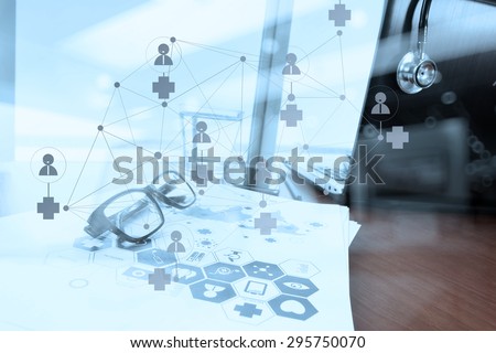 double exposure of Doctor workspace with laptop computer in medical workspace office and medical network media diagram as concept