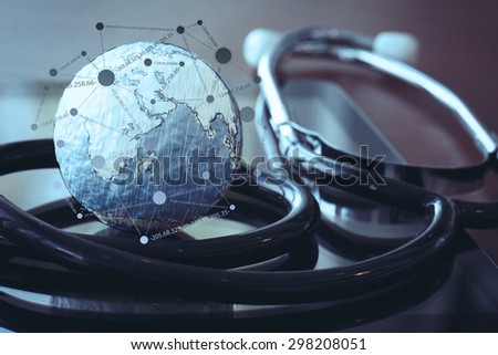 stethoscope and texture globe with digital tablet with social media network diagram as medical network concept