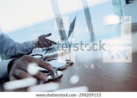 double exposure of Doctor working at workspace with laptop computer in medical workspace office as concept
