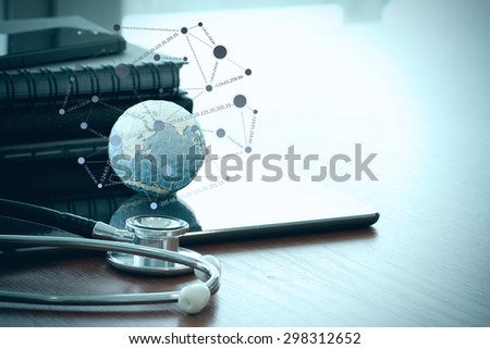 stethoscope and texture globe with digital tablet with social media diagram as medical network concept