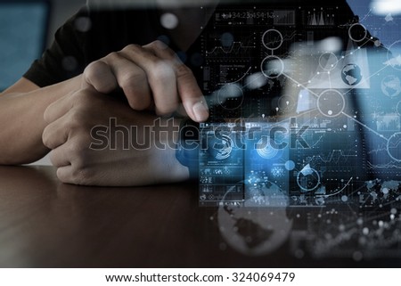 Businessman hand using digital smart watch with digital layer effect as business strategy concept