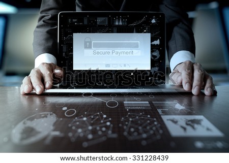 hands using laptop and holding credit card with \