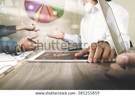 Businessman making presentation with his colleagues and business strategy digital layer effect at the office as concept