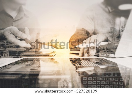 Double exposure of Business team meeting present. Photo professional investor working with new start up project. Digital tablet laptop computer with London architecture,building