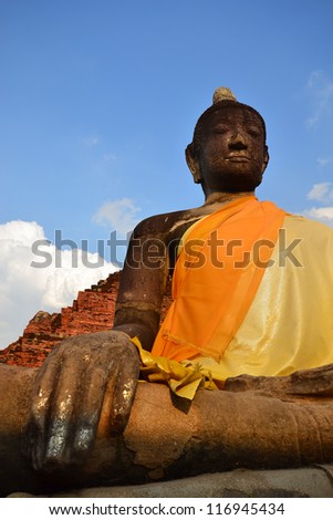 AYUTTHAYA, THAILAND - MARCH 17 :An ancient Subduing Mara Buddha image in Maha That temple on March 17,2012 in Ayutthaya.