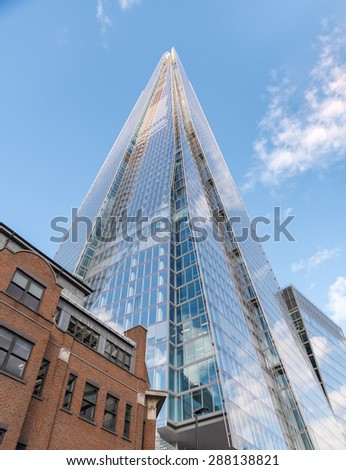The Shard is currently the tallest building in the European Union and a new London attraction. The Shard towering over London, photographed in London, UK.